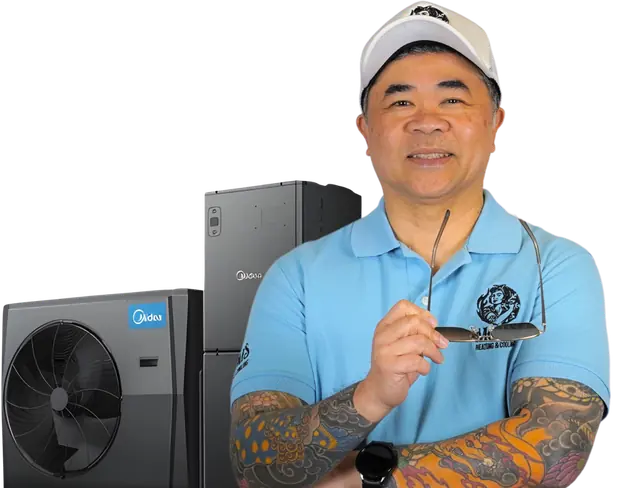 Venice Tabernero, founder of Mom&rsquo;s Heating & Cooling, beside heating and cooling equipment